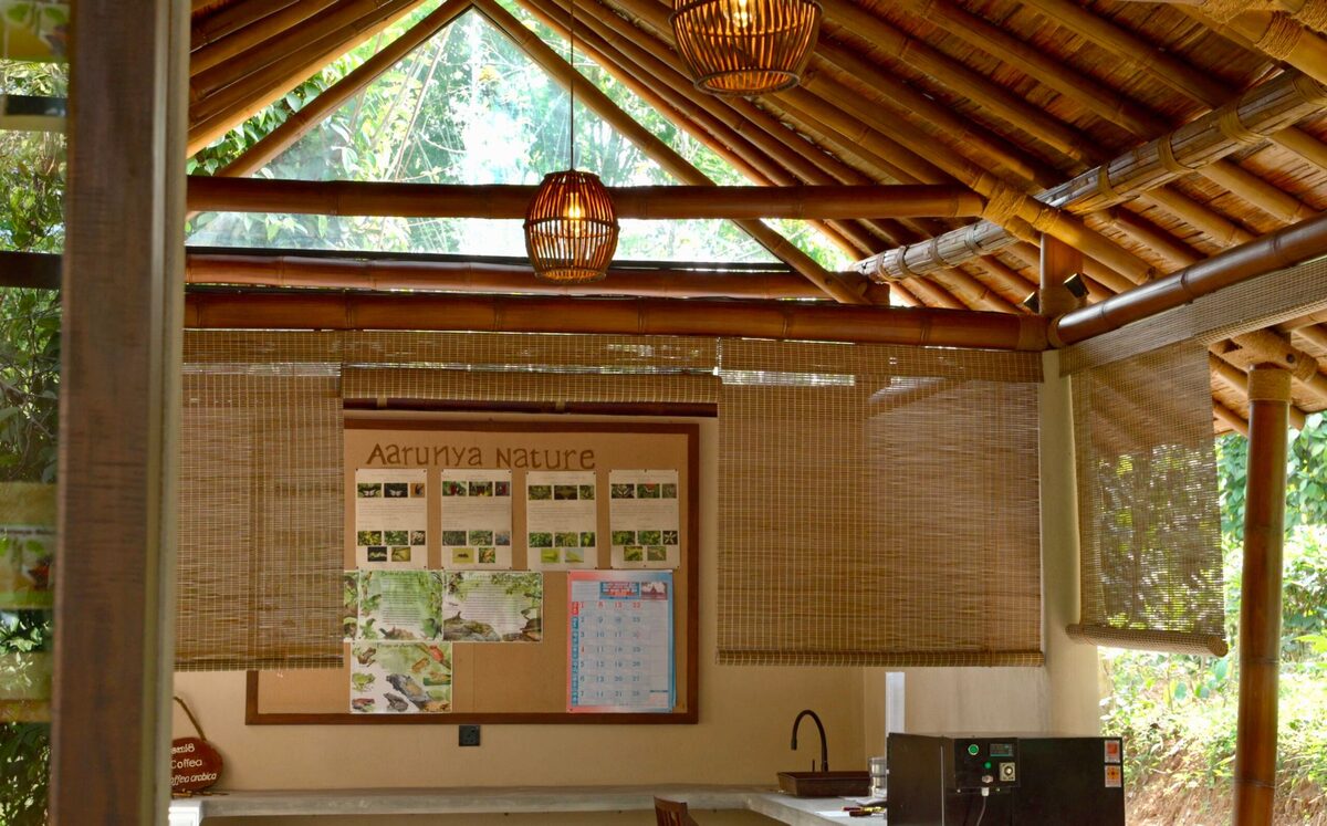 Bamboo interior of the Aarunya Nature Pavilion with boards on local birds, frogs and reptiles